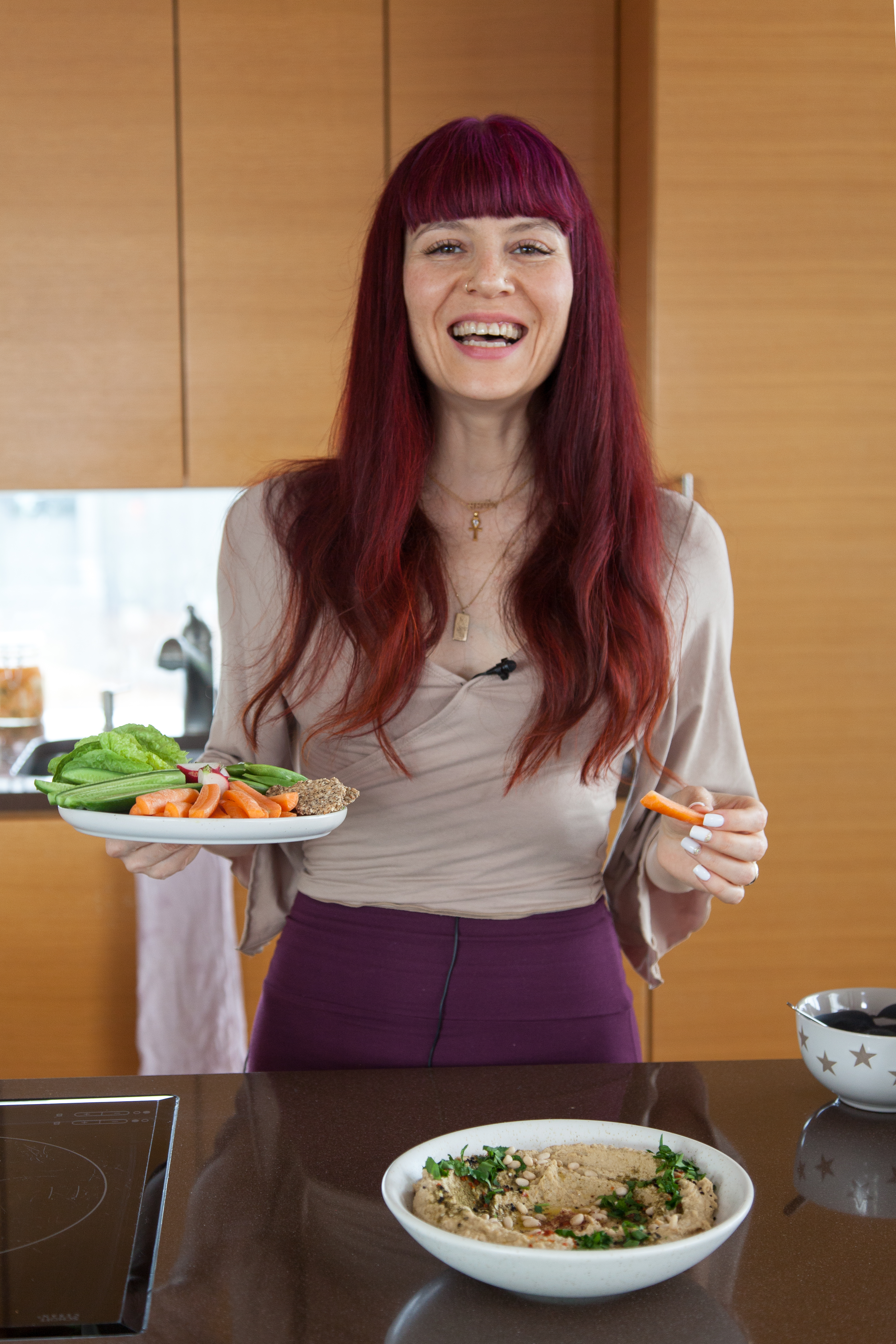 Laughing with plate of food
